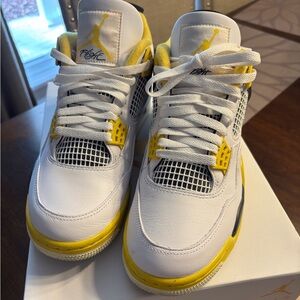 Women’s white and Yellow Air Jordan 4 Sneakers